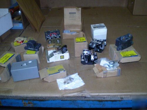 New lot of 12 square d misc. parts, 