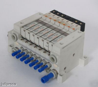 (7) smc VQ1101-5 5-port solenoid valves w/ manifold