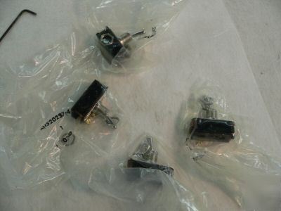 New 4 tyco toggle switches 