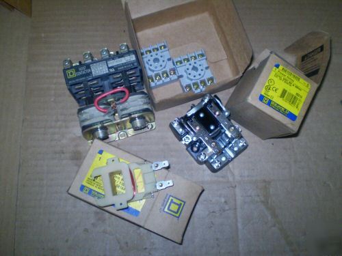 New lot of 12 square d misc. parts, 